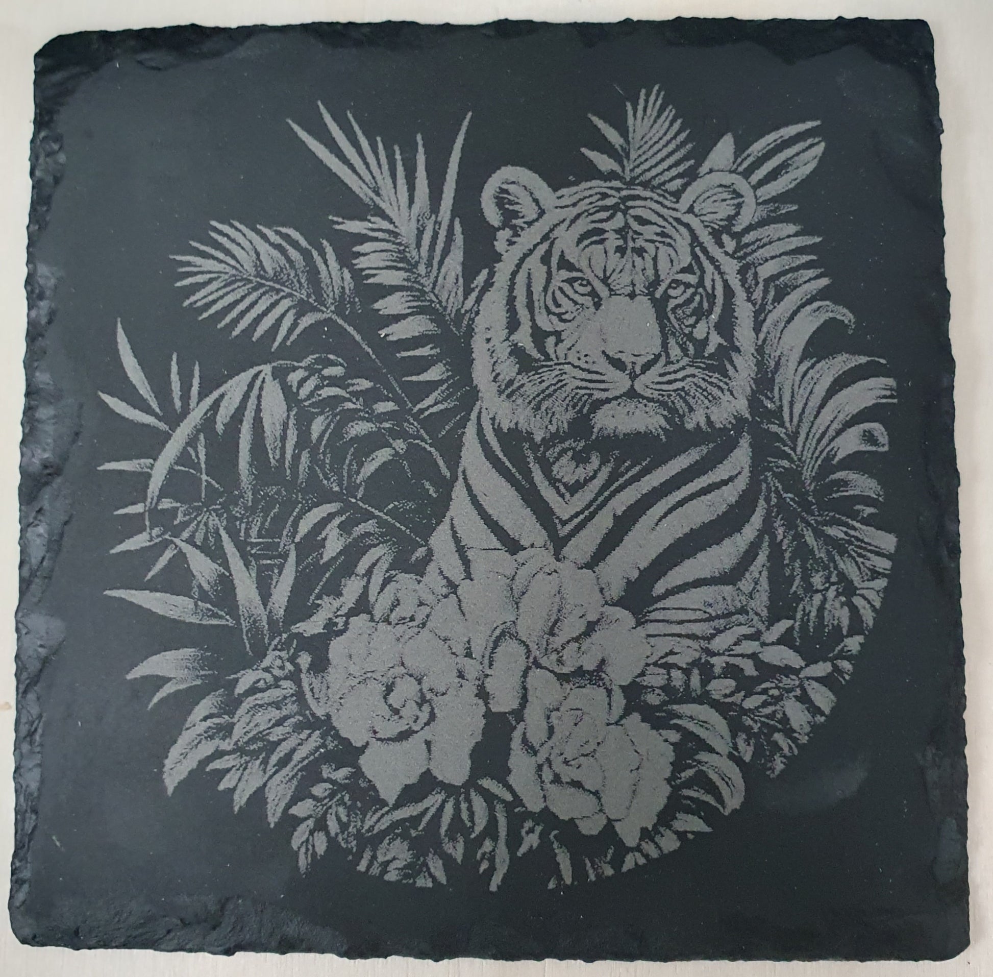 Slate coaster with engraved tiger and floral design