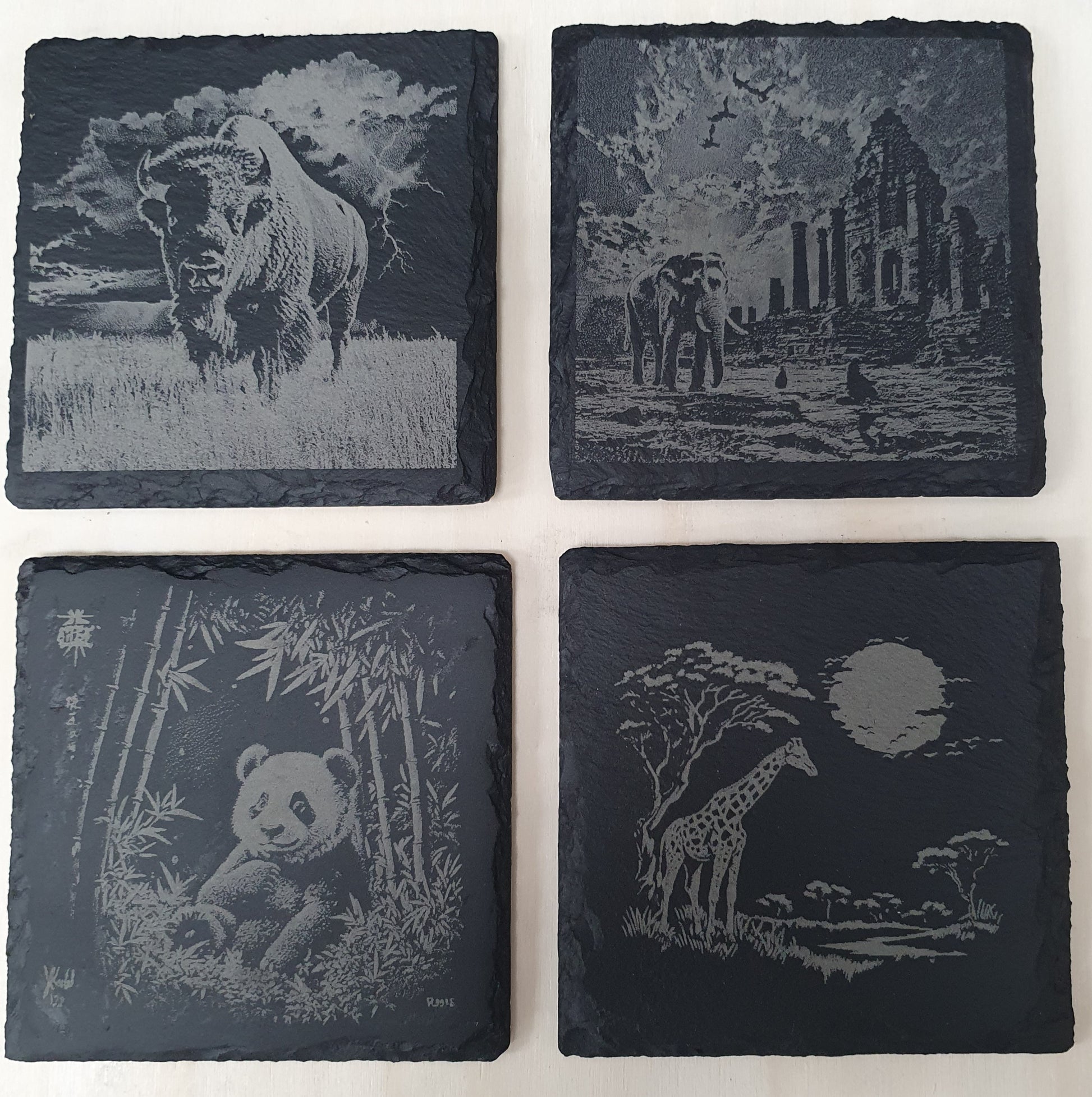 4-Piece Engraved Wildlife Slate Coaster Set - Giraffe, Bison, Elephant & Panda