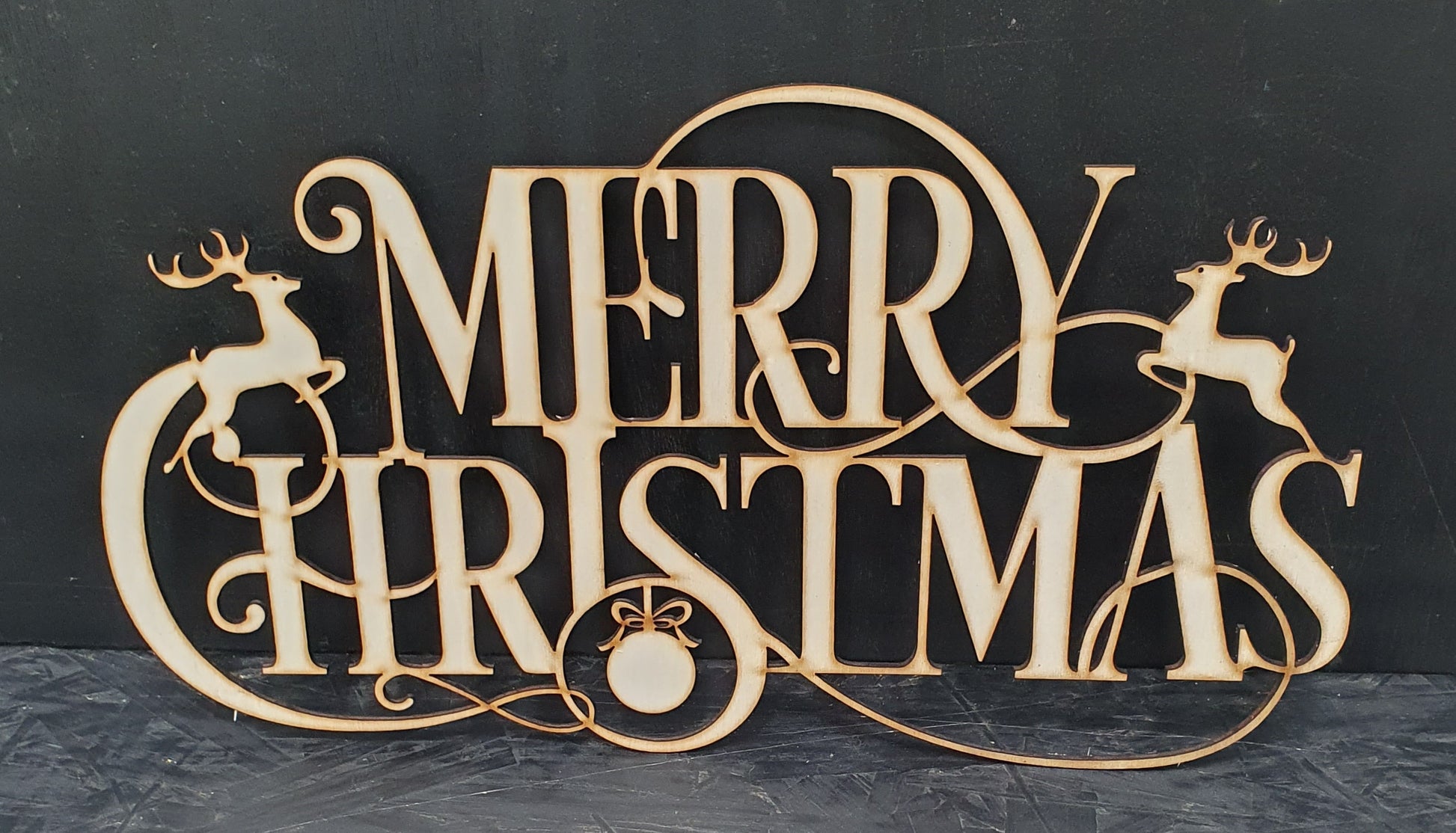 Wooden 'Merry Christmas' decoration with reindeer ready to paint