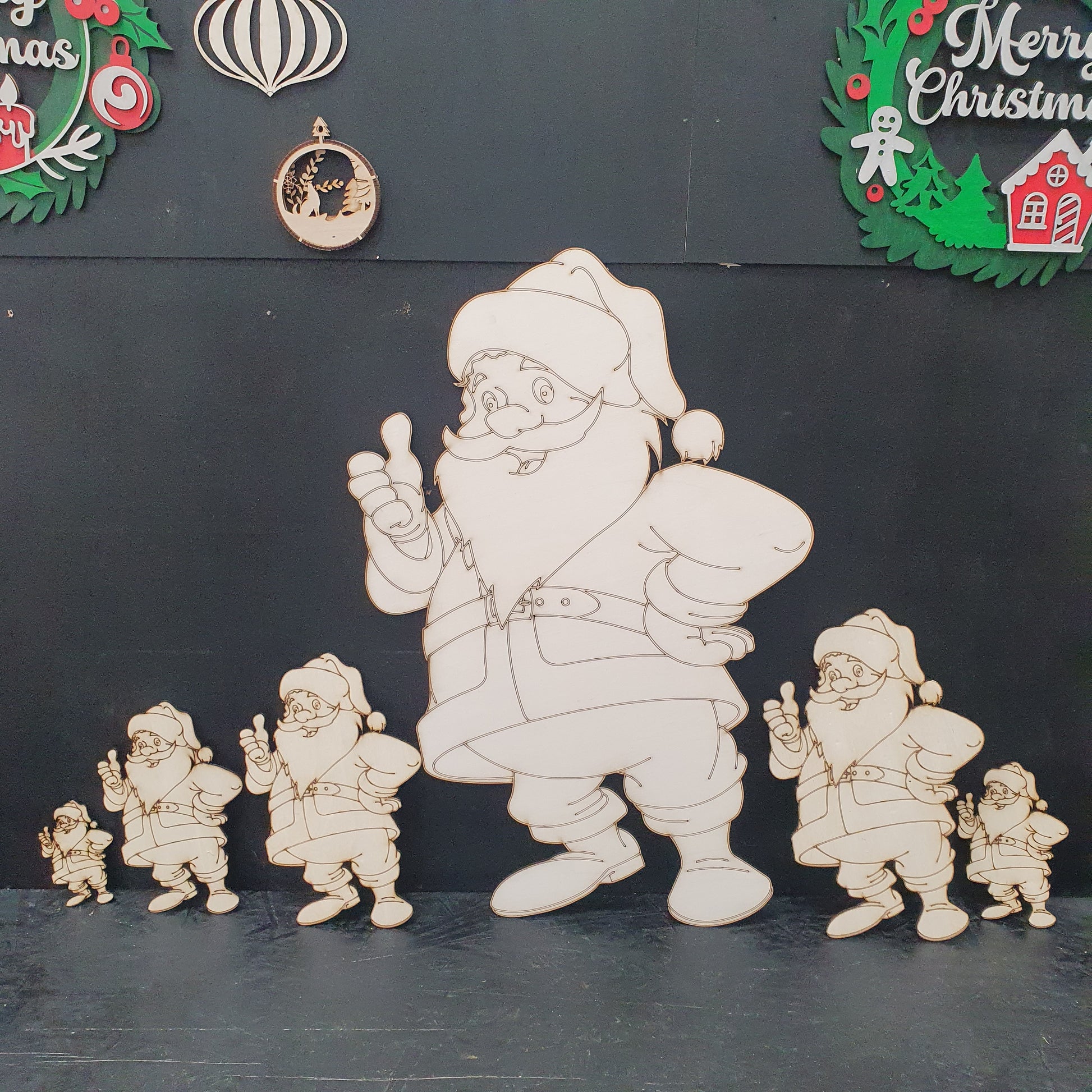 Wooden Santa Claus cut out figure ready to paint in various sizes.