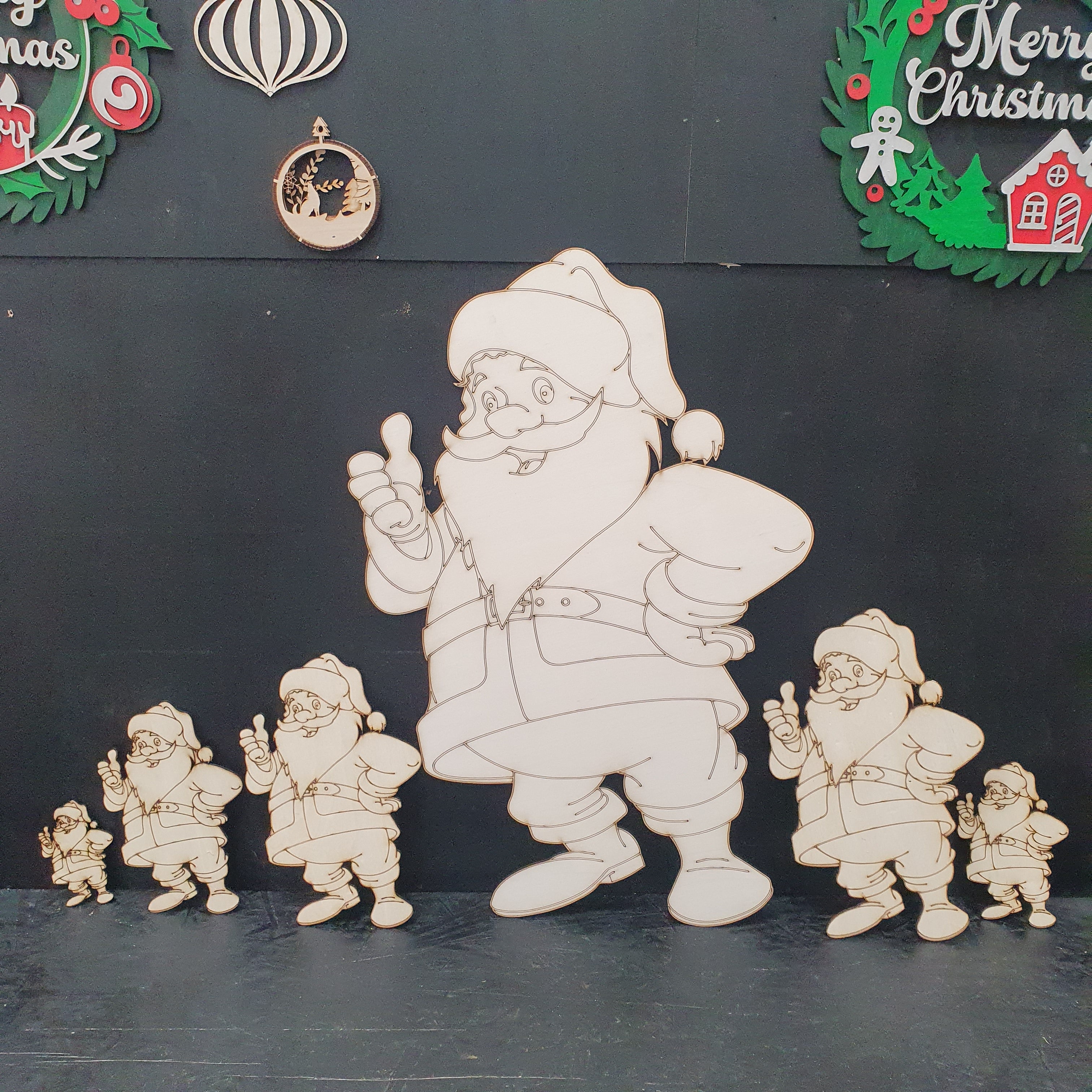 Wooden Santa Claus cut out figure ready to paint in various sizes.