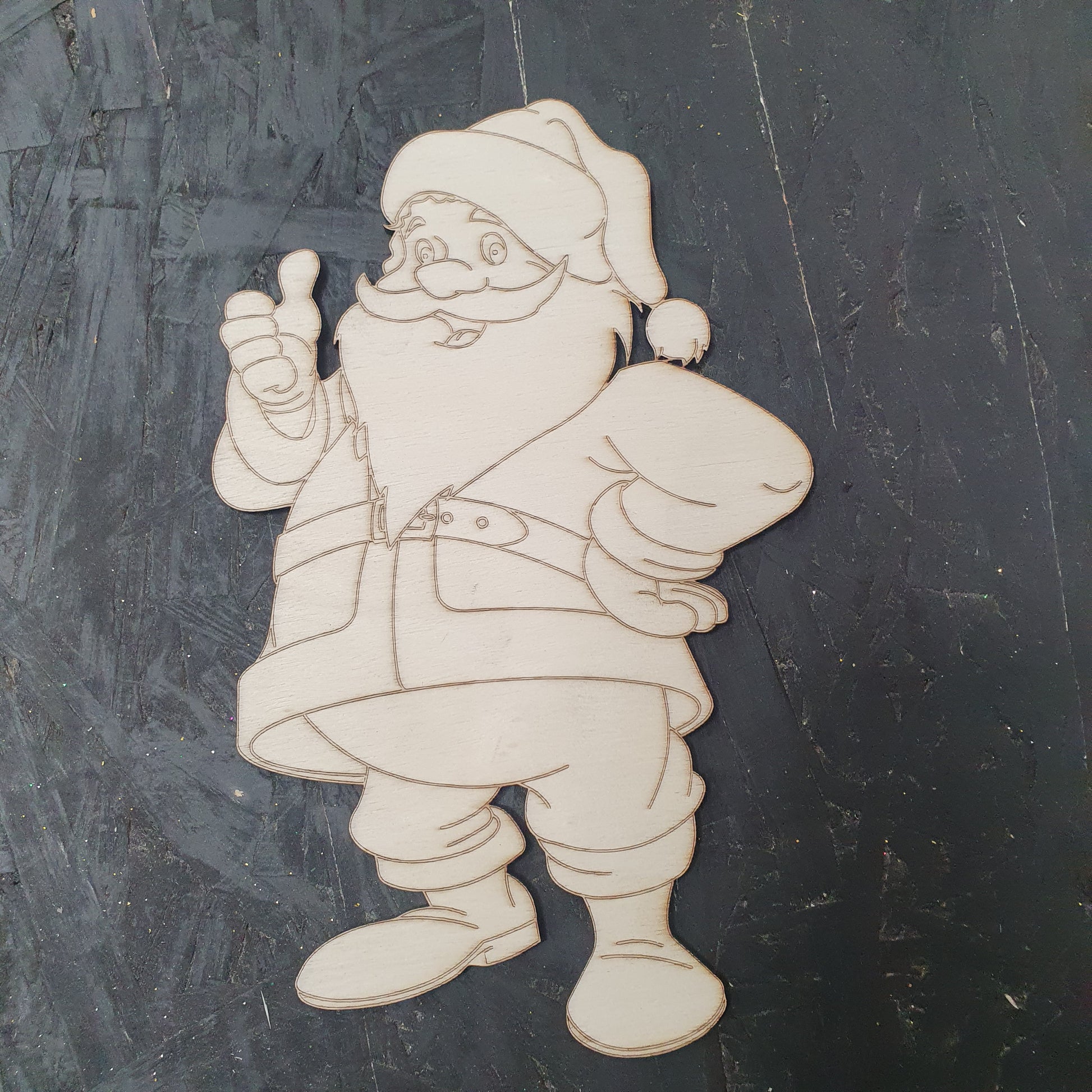 Wooden cutout of a Santa character ready to paint
