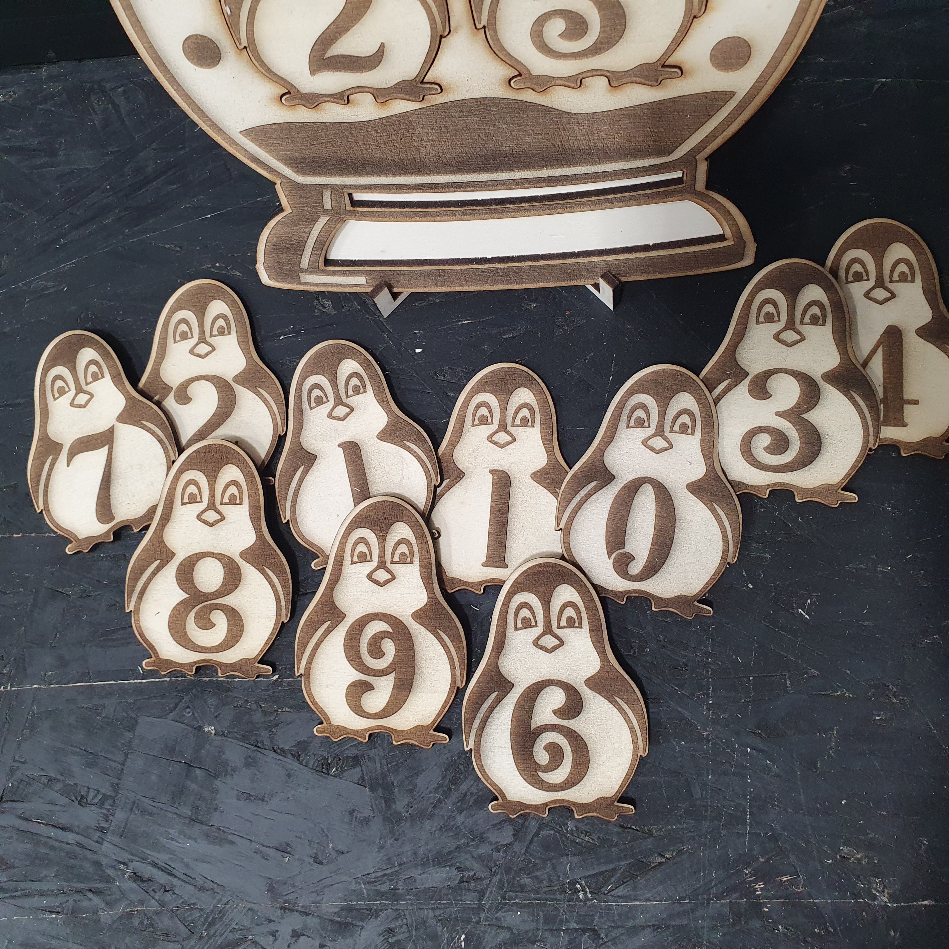 Personalised Penguin Globe Christmas Countdown – Wooden Advent Decor with Numbered Cut-Outs & Stand 