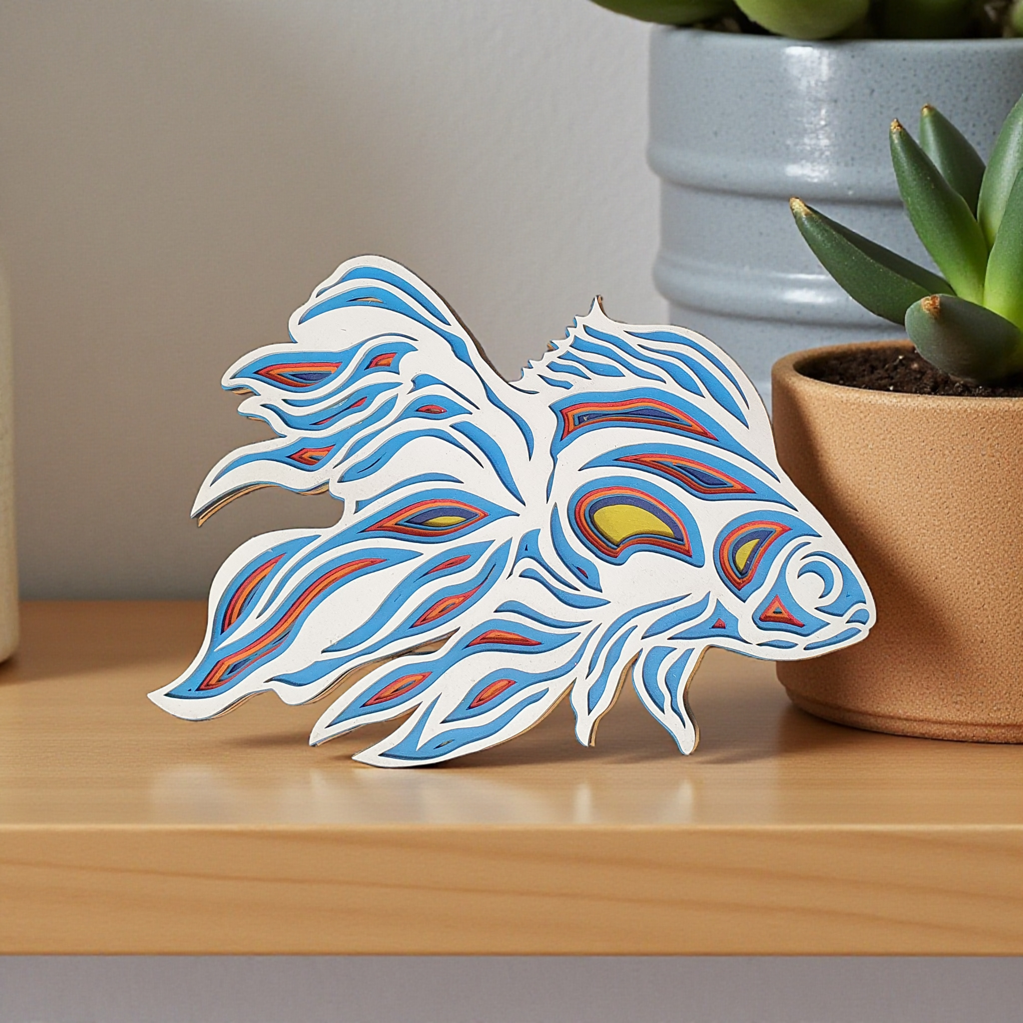 Hand-painted 7-layer MDF stylised fish wall art with flowing fins