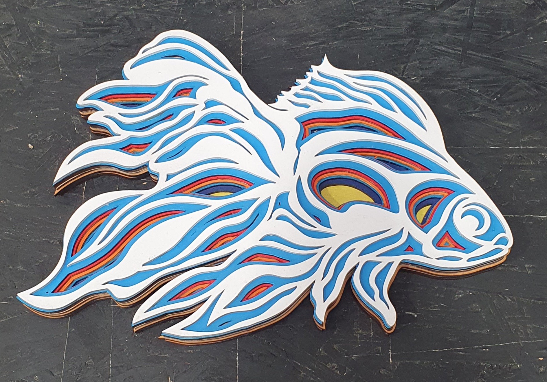 tylised fish wall plaque with seven laser-cut MDF layers