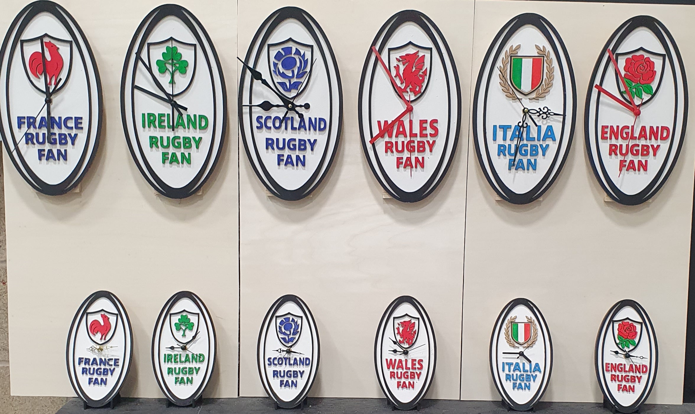 Six Nations rugby ball wall clock hand-painted in team colours”