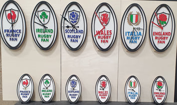 Six Nations rugby ball wall clock hand-painted in team colours”