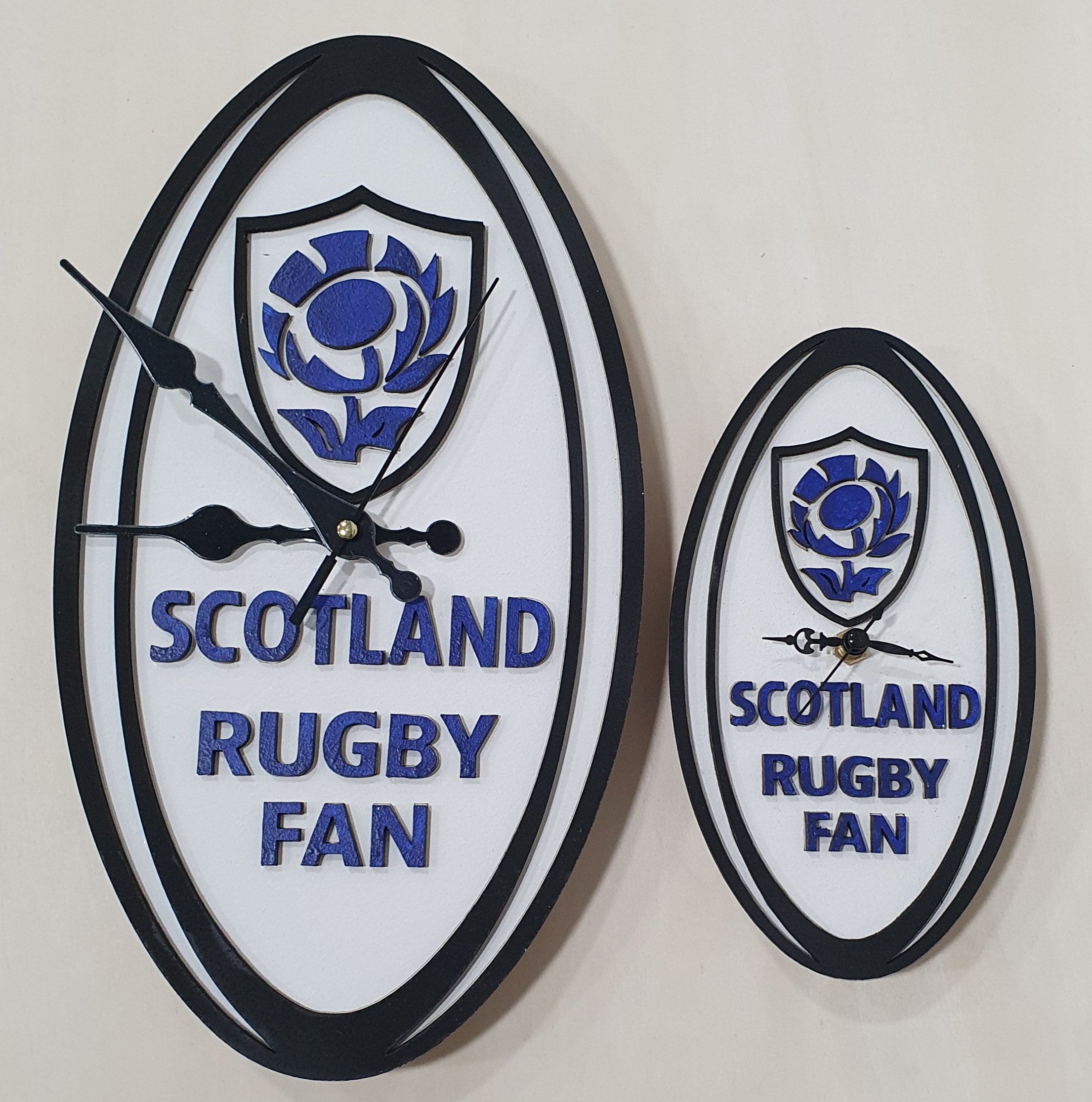 Hand-painted rugby ball clock available in wall or desk size for Six Nations fans