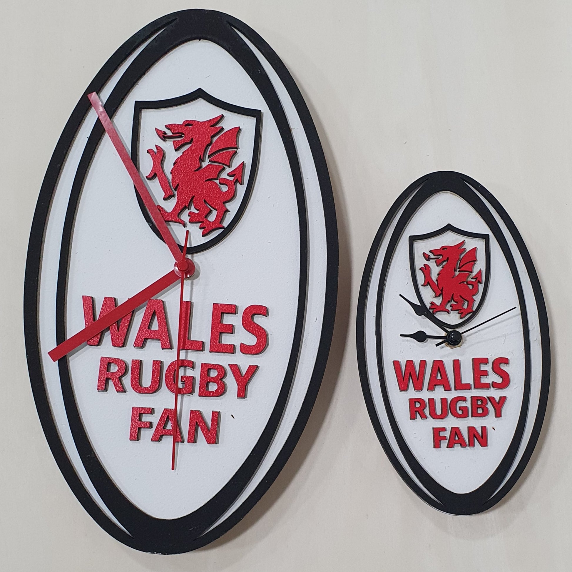 Hand-painted rugby ball clock available in wall or desk size for Six Nations fans