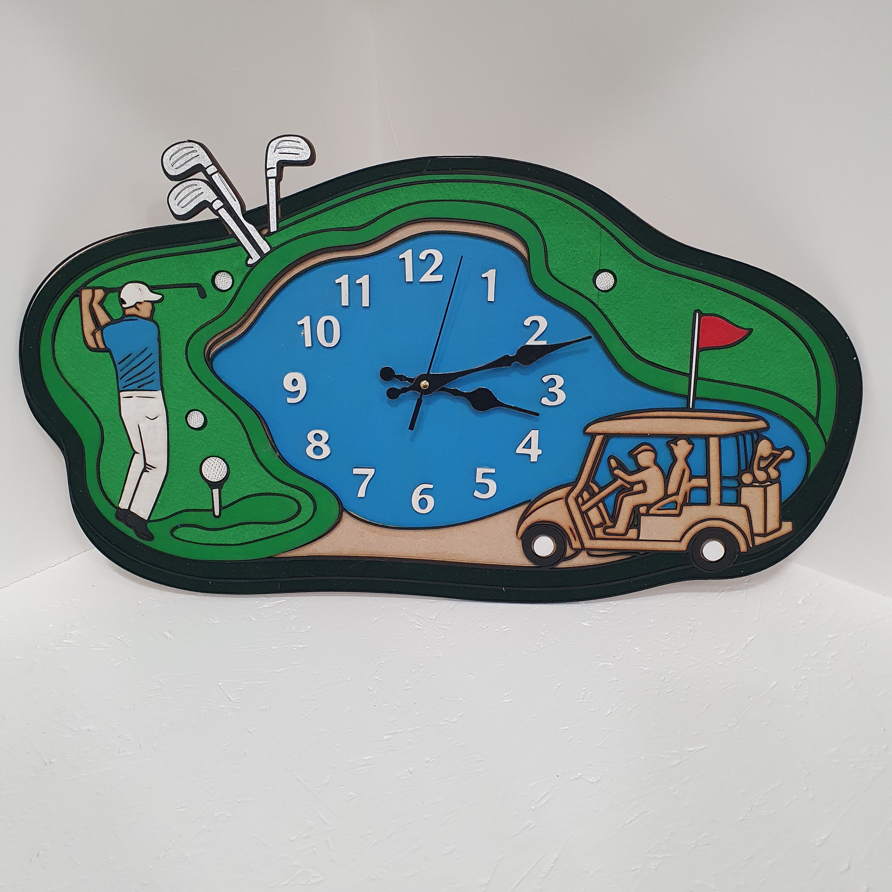 large golf course wall clock with golfer and buggy