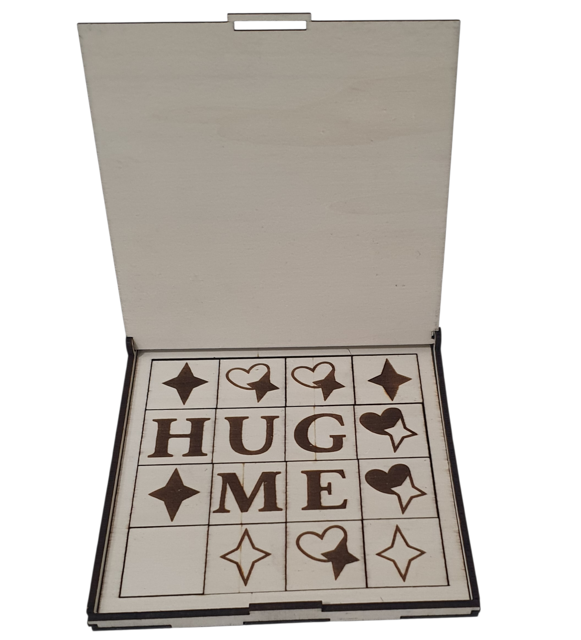 Handmade Hug Me wooden puzzle displayed inside presentation box with decorative symbol tiles
