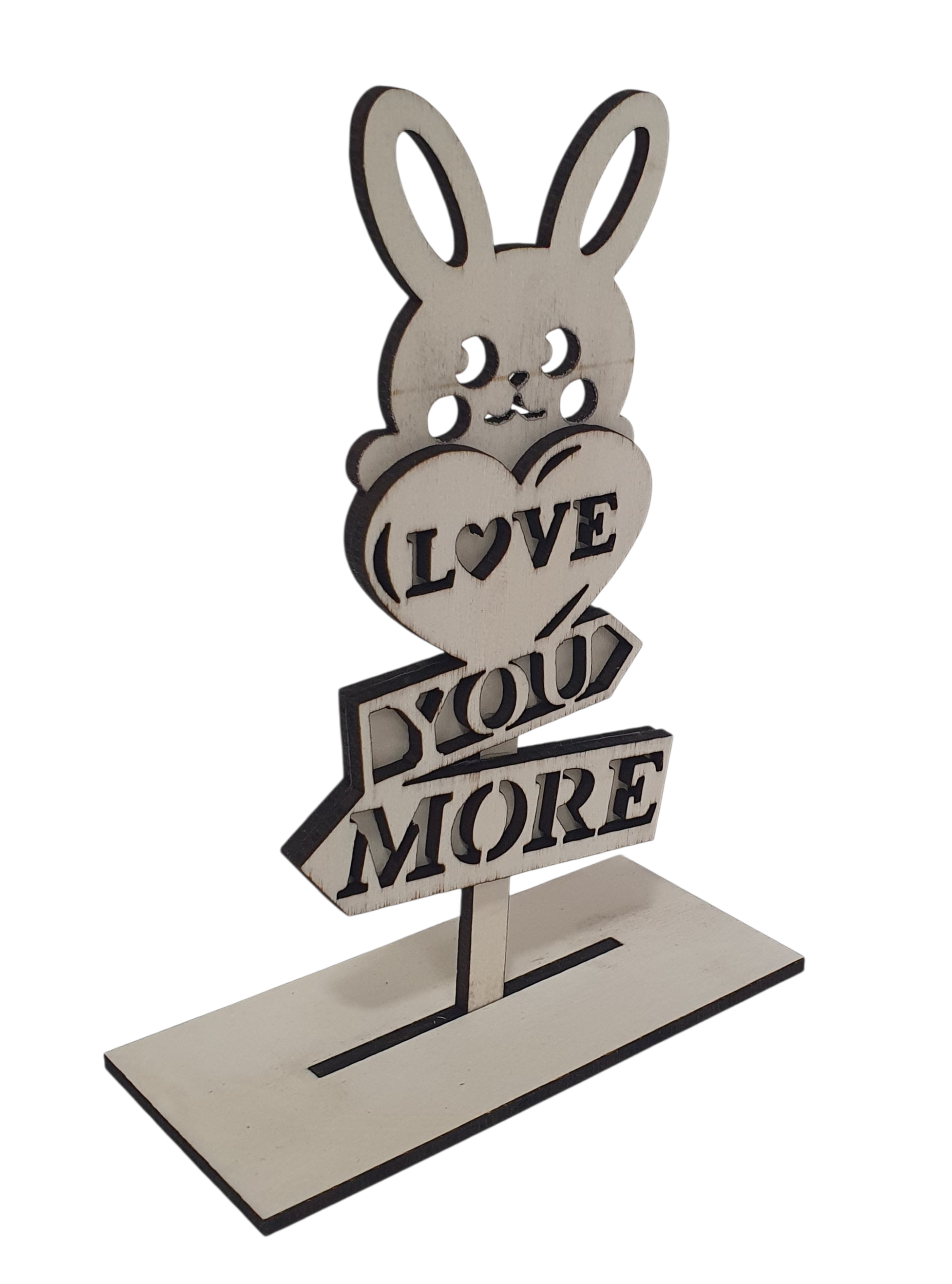 Cute wooden bunny holding heart with “Love You More” text, table decoration