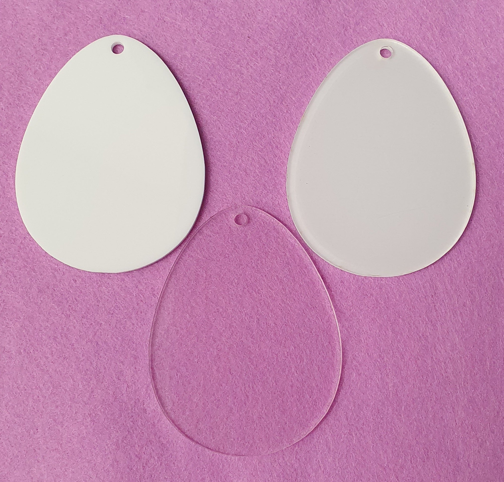 3mm cast acrylic Easter egg blanks measuring 7.5cm x 10cm available in clear, white and sublimation reverse finishes with smooth laser cut edges.