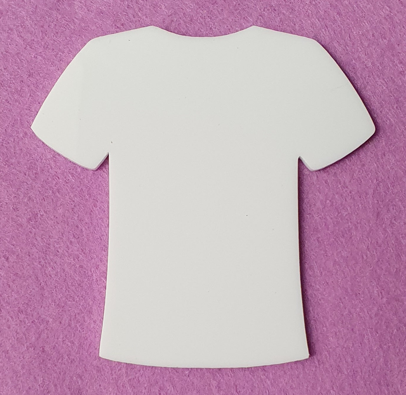 White acrylic T-shirt craft blank close up showing solid surface ideal for vinyl application, UV printing and sublimation projects.