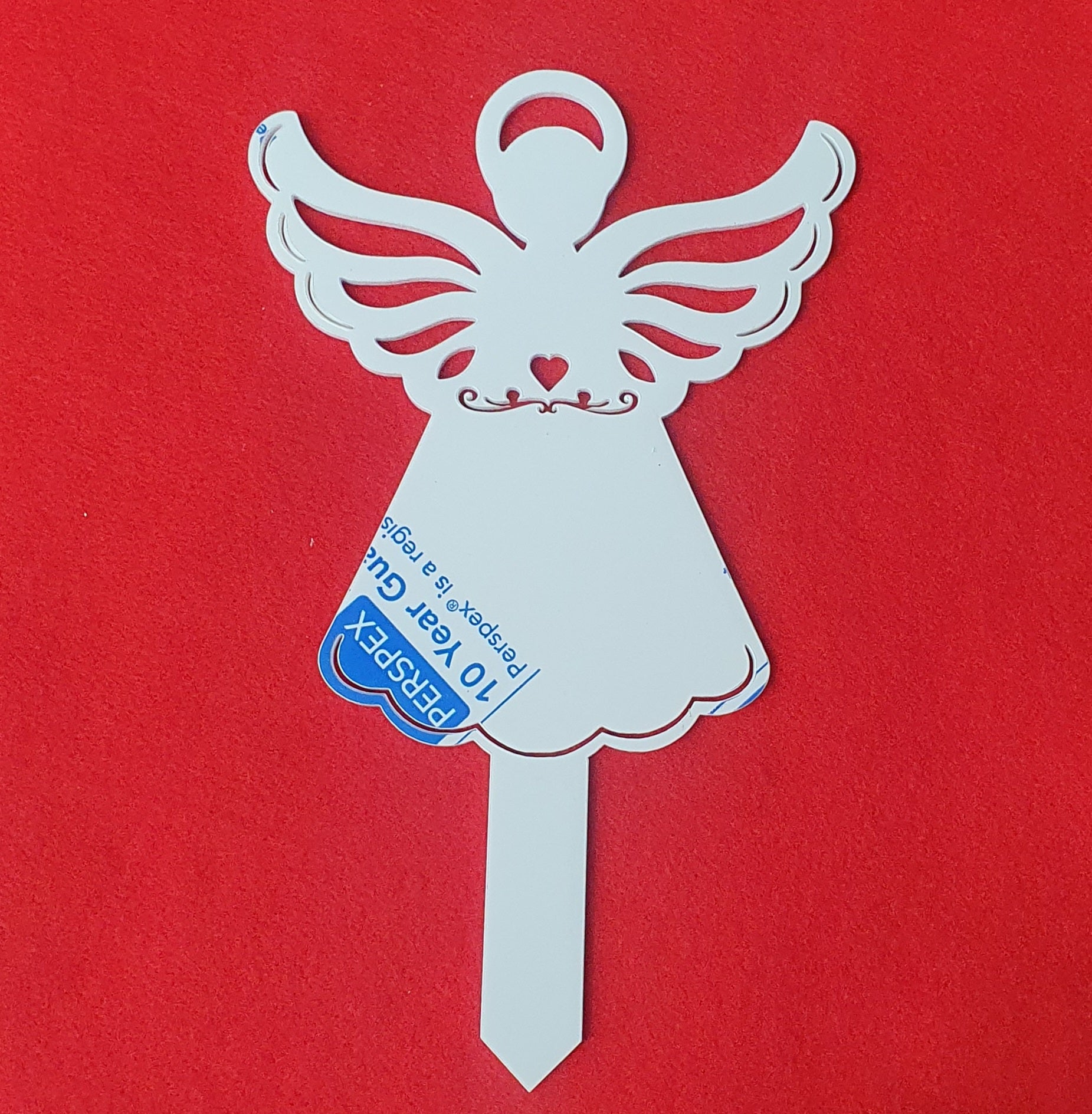 3mm cast acrylic angel grave marker measuring 25cm x 15cm with detailed wings, heart cut-out and integrated ground stake.