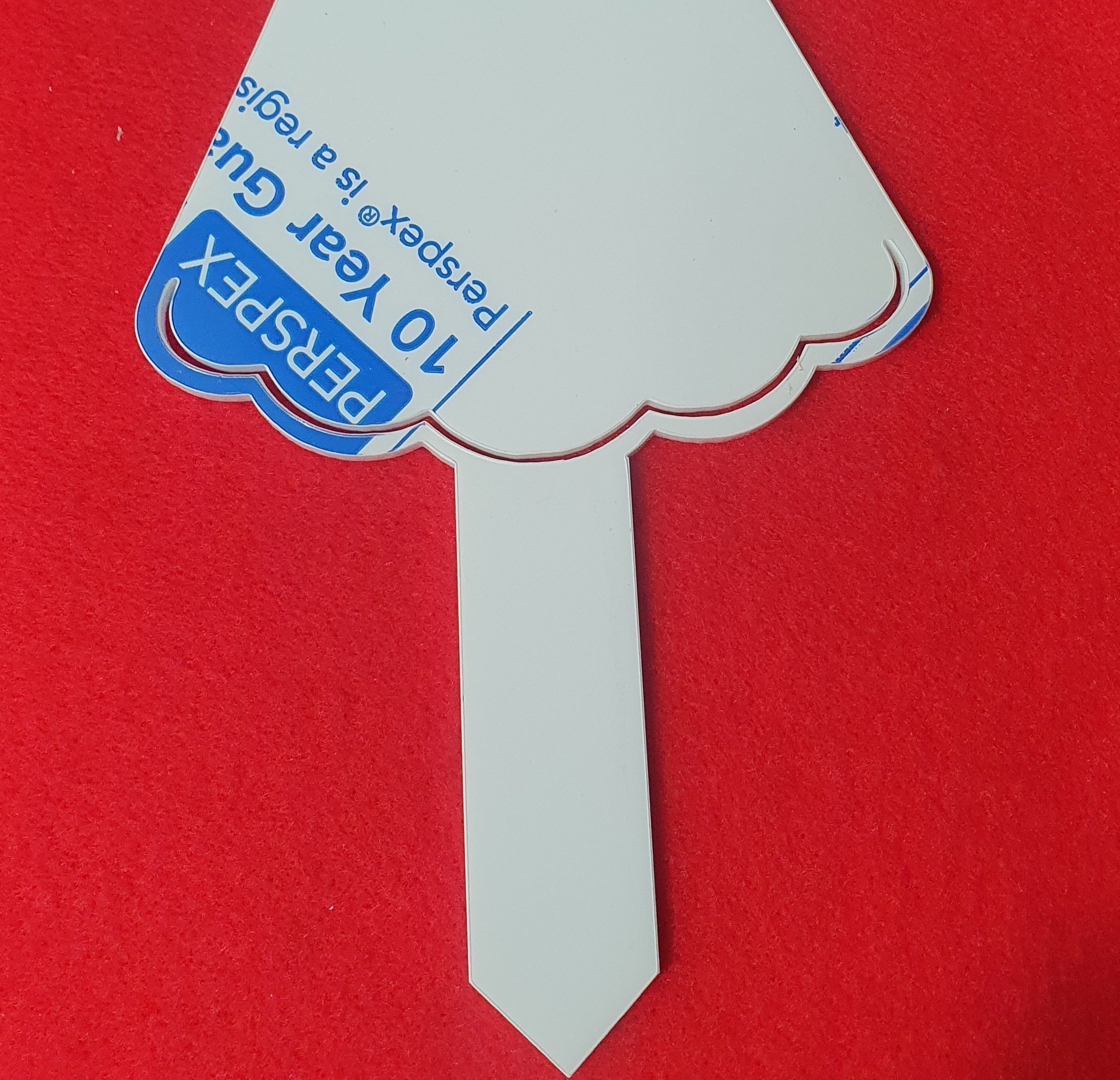 Clear acrylic angel grave marker blank designed for personalised remembrance tributes and garden memorial displays.