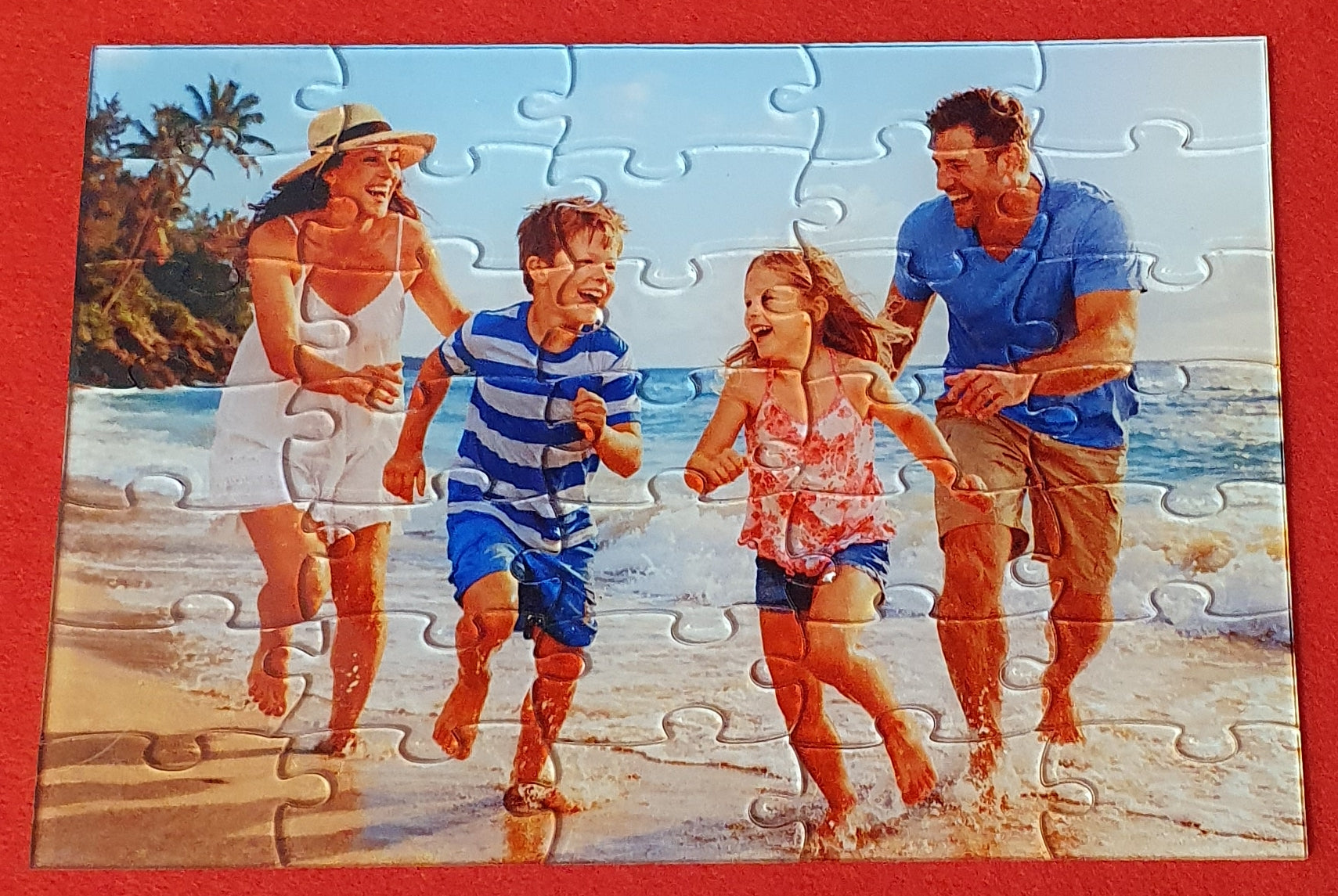 Personalised photo jigsaw puzzle featuring your own favourite photograph, supplied in a presentation box with a custom printed lid, creating a unique keepsake gift for family and friends.