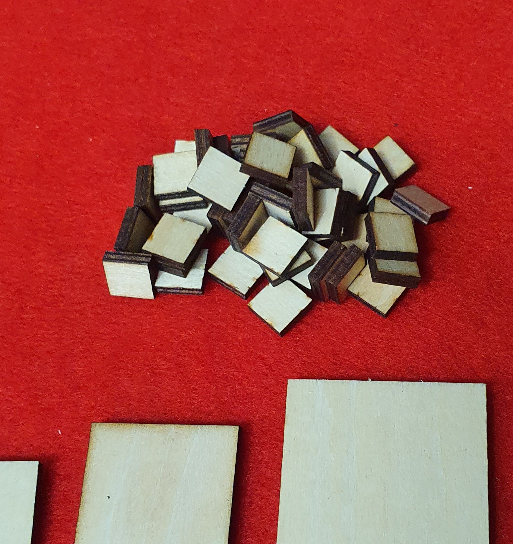 Assorted basswood ply squares from 10mm to 300mm for craft projects.