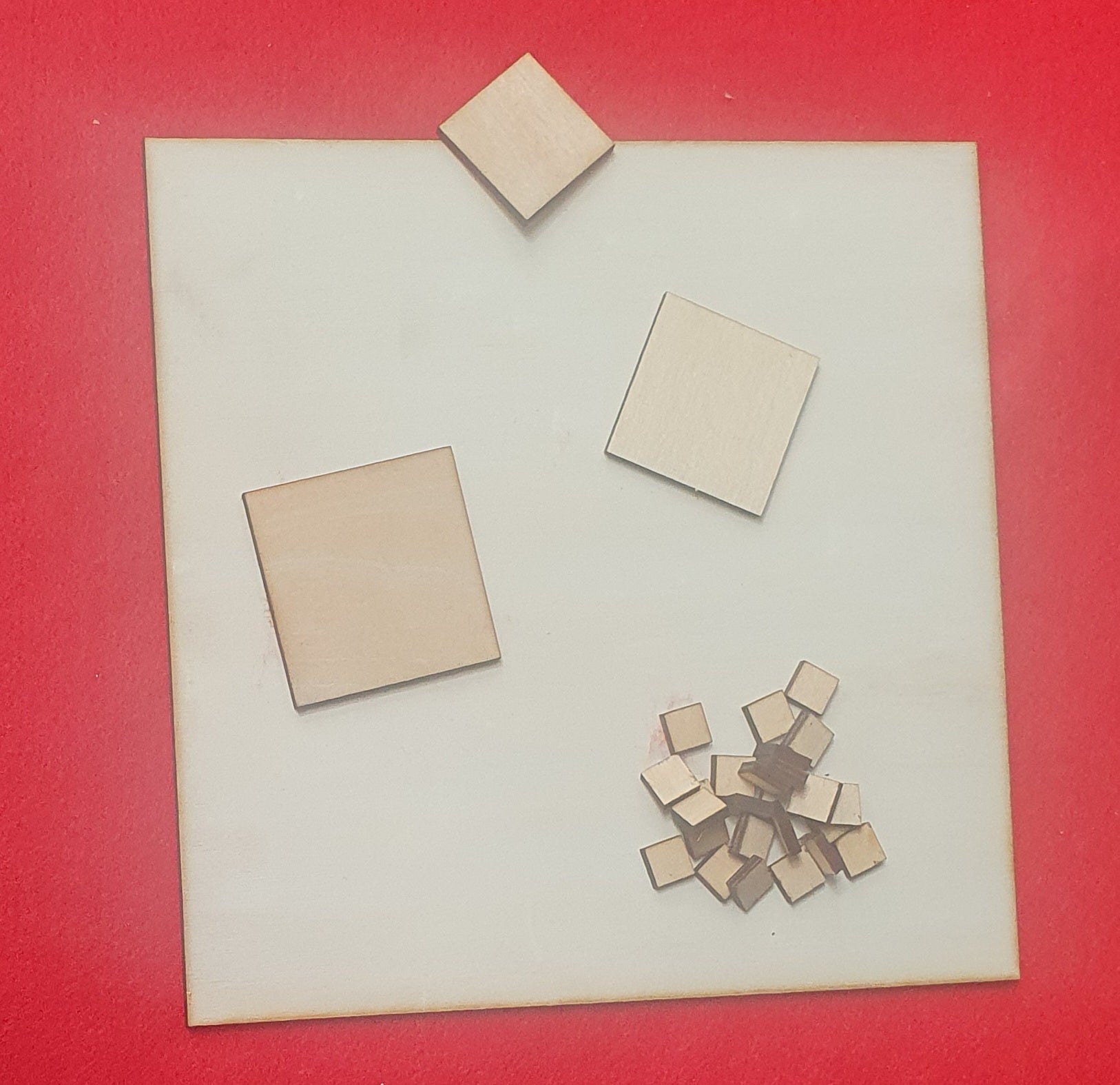 Small and large unfinished wooden square shapes for painting, engraving and DIY crafts.
