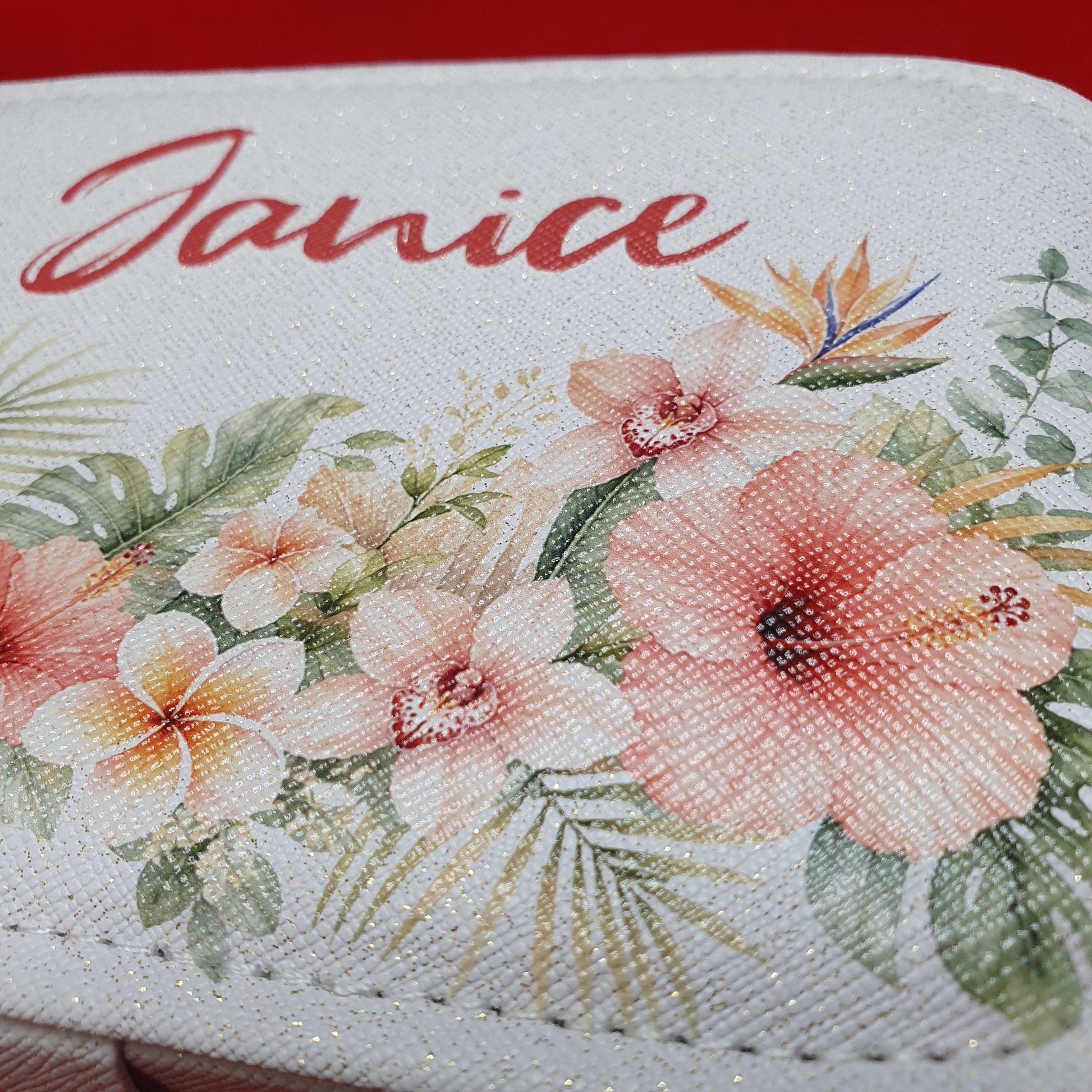 Floral personalised jewellery storage box customised with any name, featuring a secure press-stud closure and soft interior for protecting rings, necklaces and earrings.