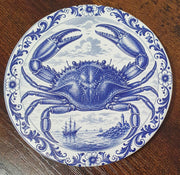 Set of six ceramic sea creature coasters featuring cobalt blue illustrations of ocean animals with cork backing.