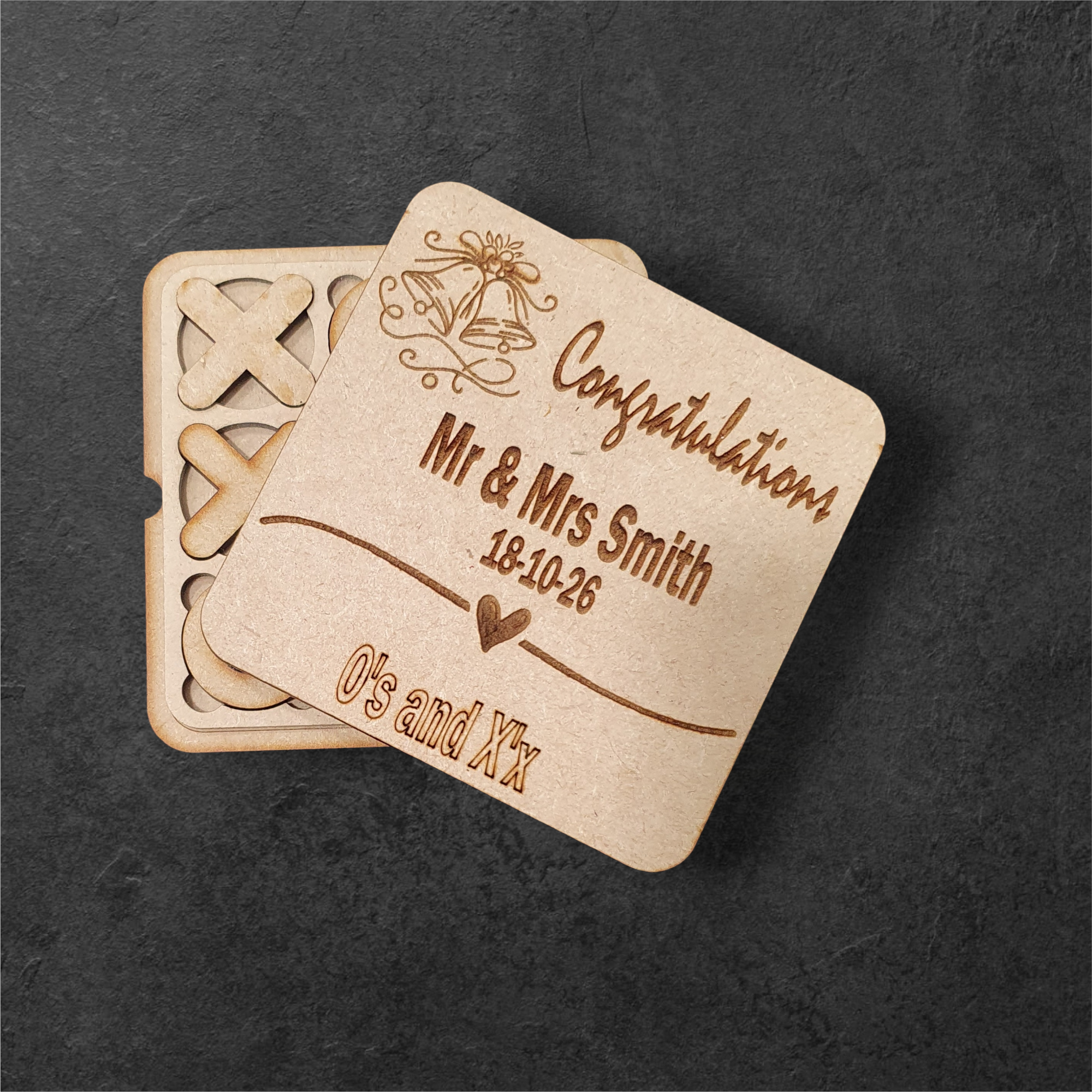 Personalised jigsaw, tic tac toe, and puzzle wedding favours in wooden design