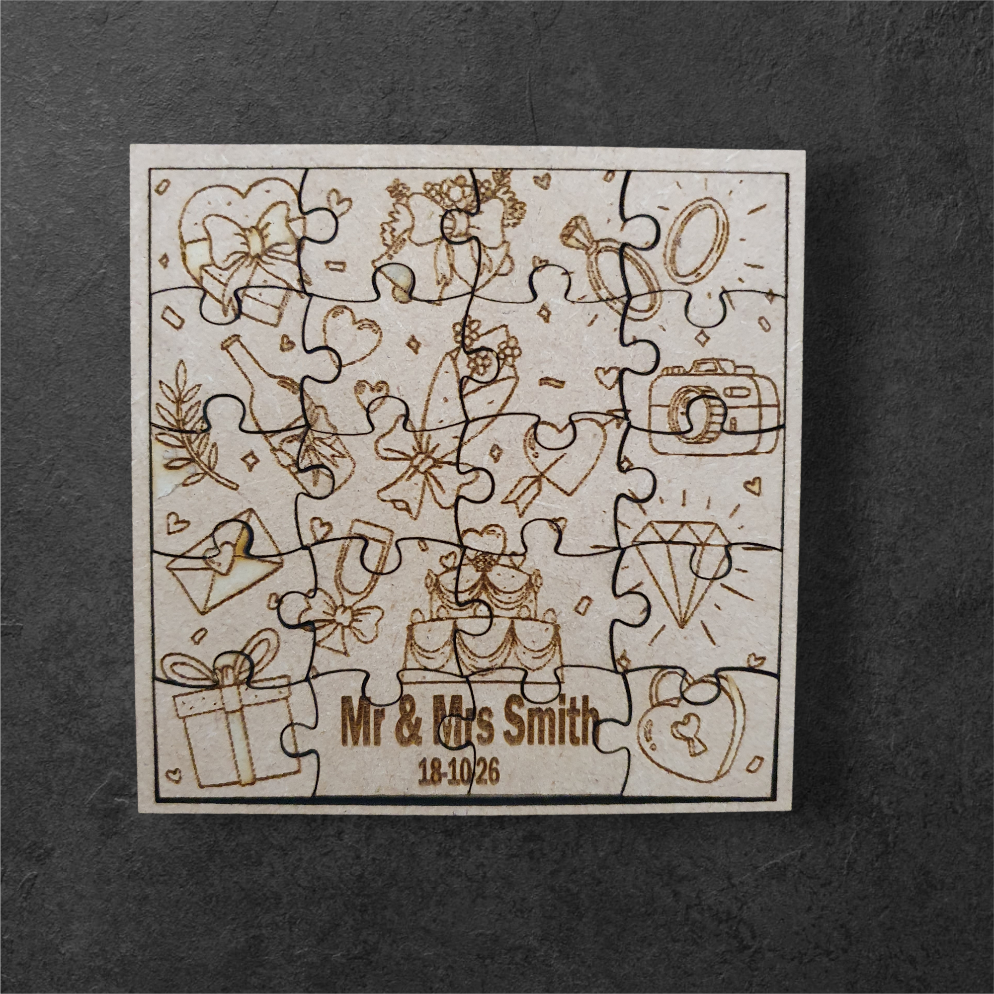 Engraved wooden wedding keepsake games displayed on a rustic table