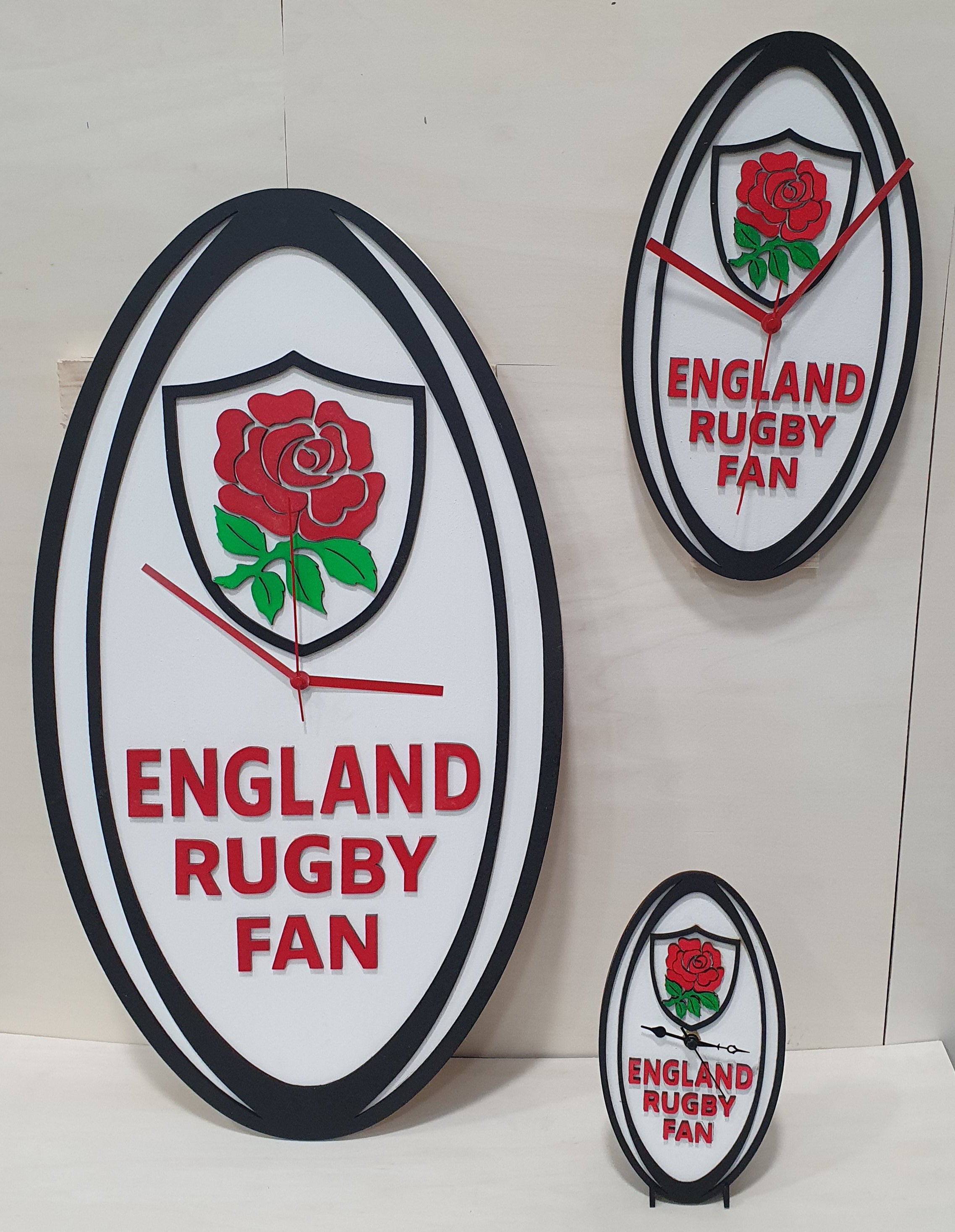 Six Nations rugby ball wall clock hand-painted on MDF in team colours