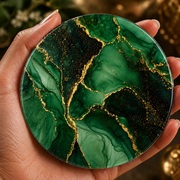 Emerald green marble effect acrylic coaster with gold veining and cork backing featuring luxurious abstract green marble design.