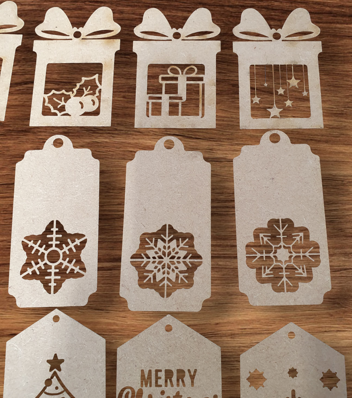 Wooden personalised Christmas gift labels measuring 7cm by 4cm