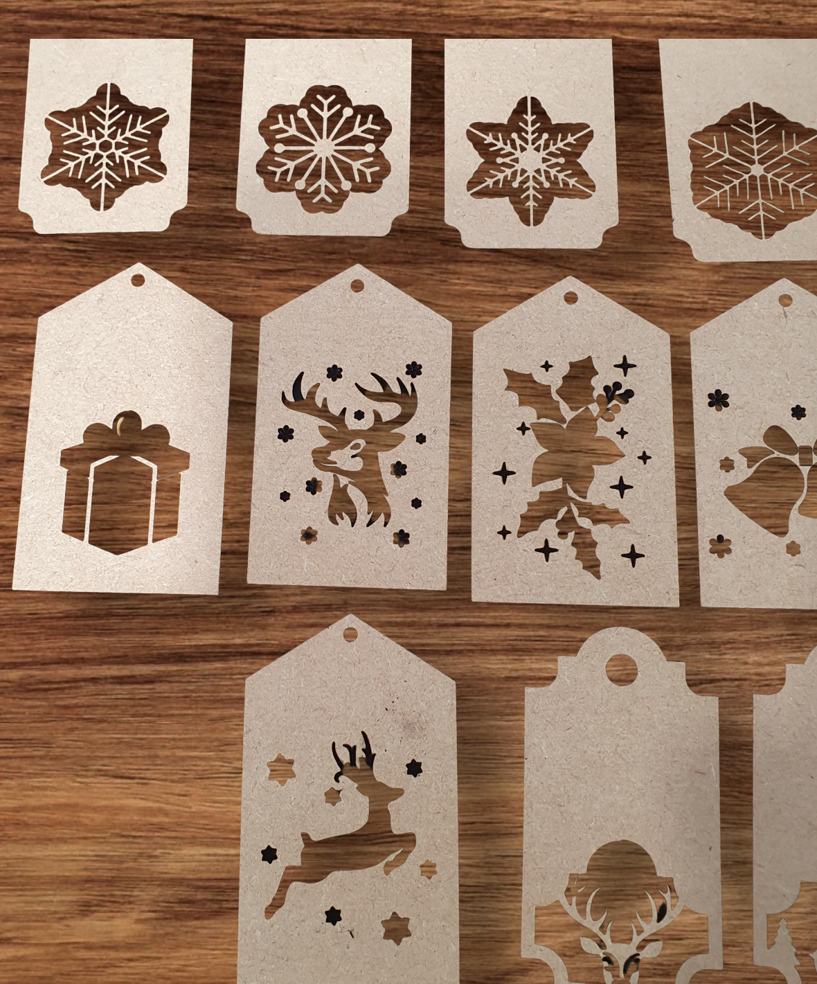 Festive wooden gift tag set with detailed laser-cut holiday designs