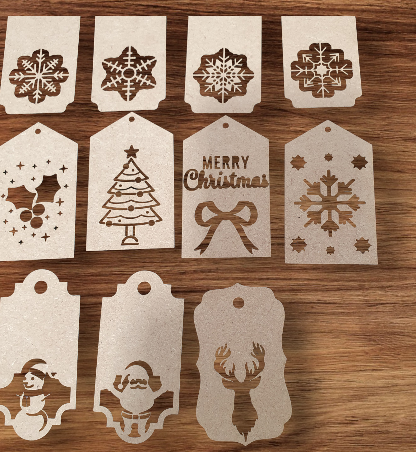 Personalised wooden Christmas gift tag with engraved name and festive cut-outs