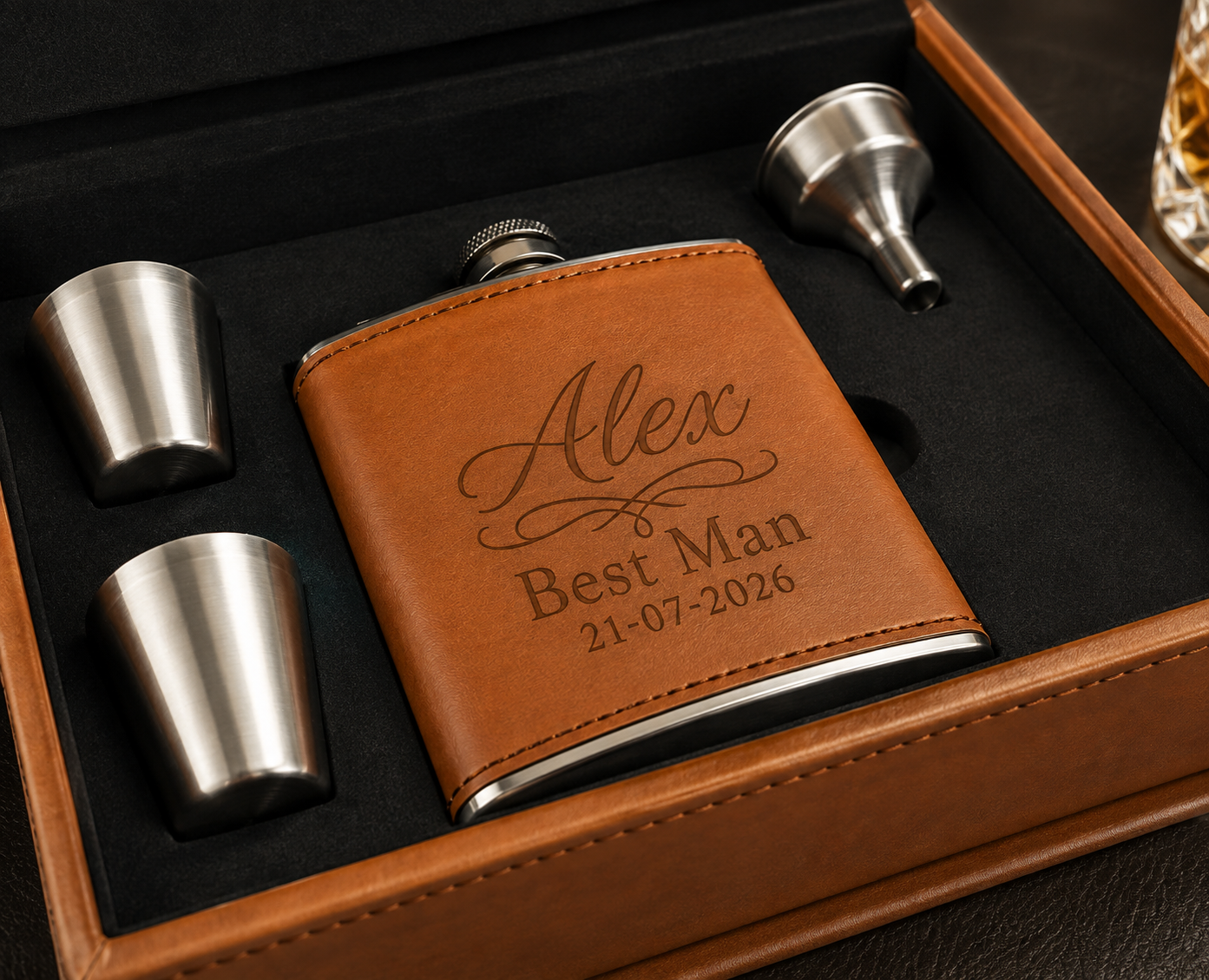 Personalised tan leather hip flask gift set with engraved flask, two shot cups, funnel and luxury presentation box.