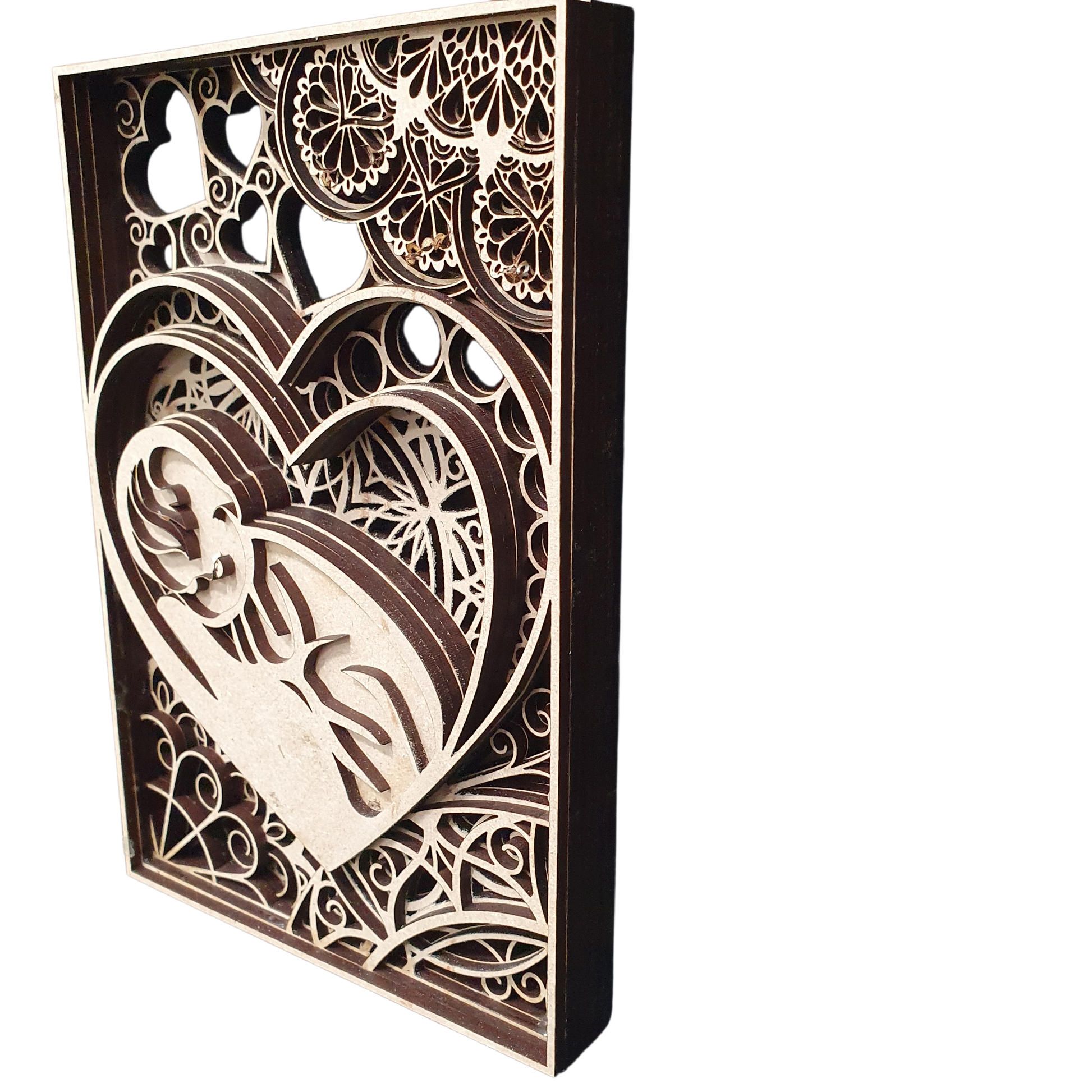 3D layered wooden baby in heart design with intricate cut-out details