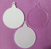 Set of 3mm acrylic bauble blanks in clear, white and clear with white sublimation reverse finishes, sized 7.5cm wide by 9.5cm tall with hanging loop at the top.