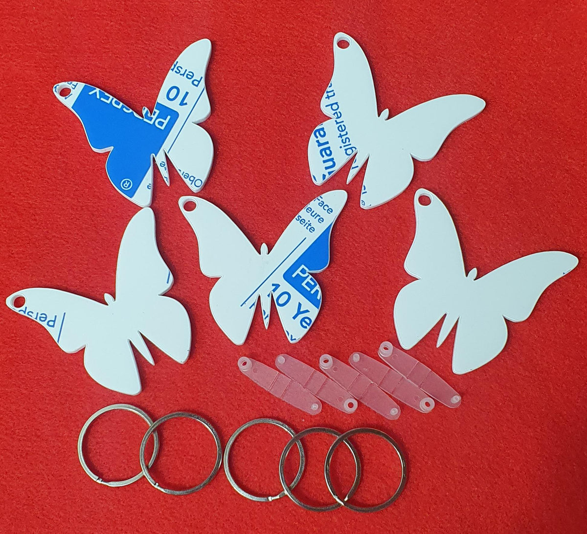 3mm cast acrylic butterfly keyring blanks measuring 6cm x 6.6cm with smooth laser cut edges and hanging hole.