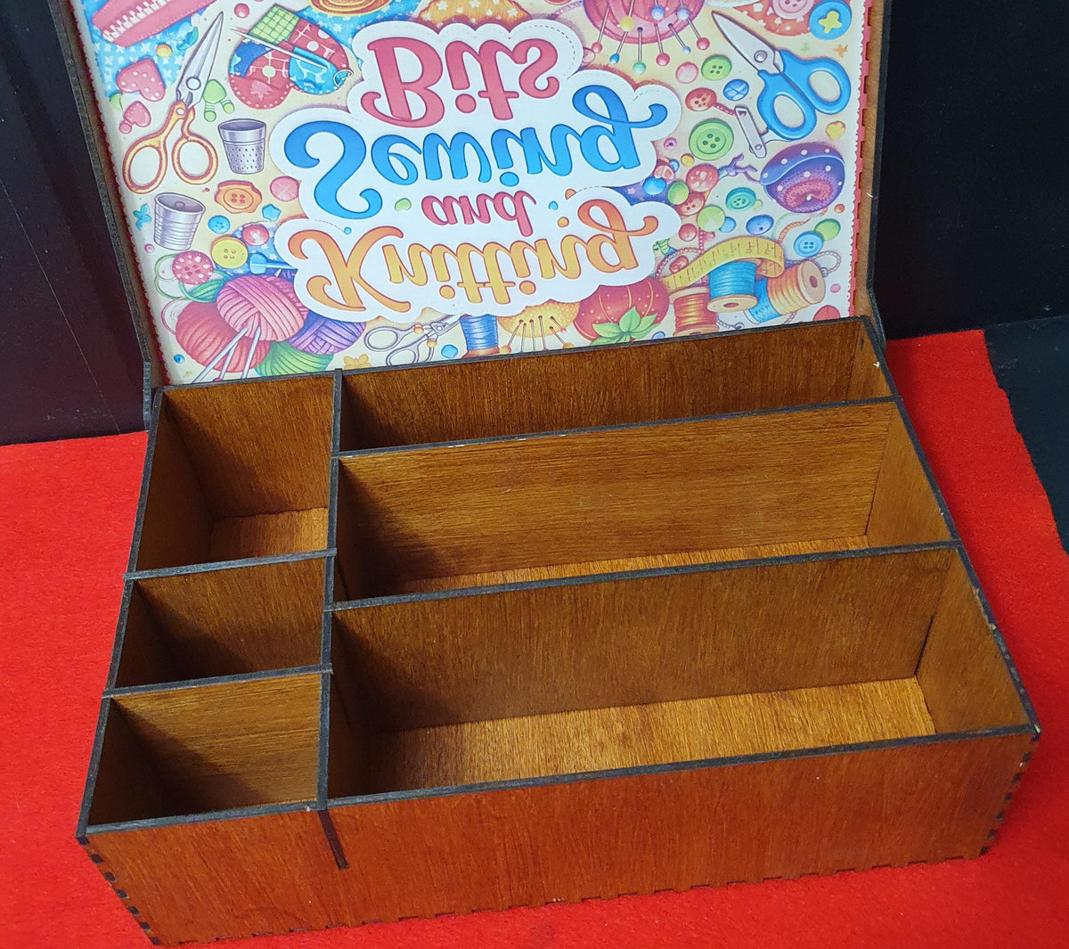Handmade wooden craft storage box measuring 28cm x 18cm x 10cm with decorative engraved edges