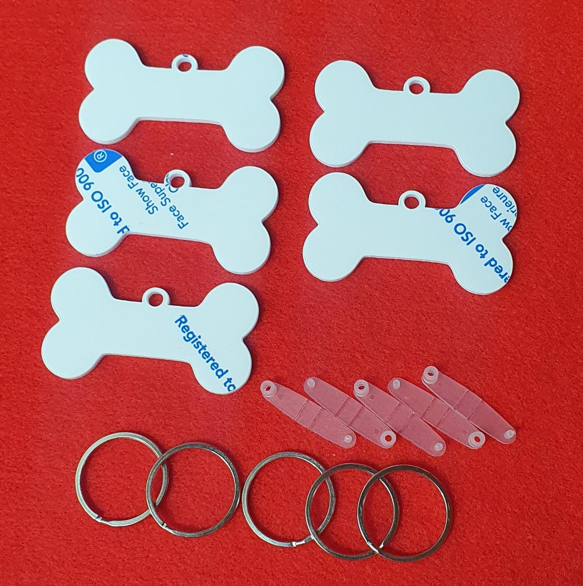 3mm cast acrylic dog bone keyring blanks measuring 7cm x 3.8cm with smooth laser cut edges and hanging hole.