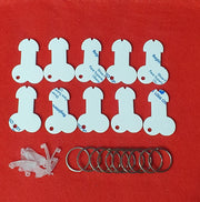 White acrylic willy shaped trolley token blanks with keyring clips and split rings