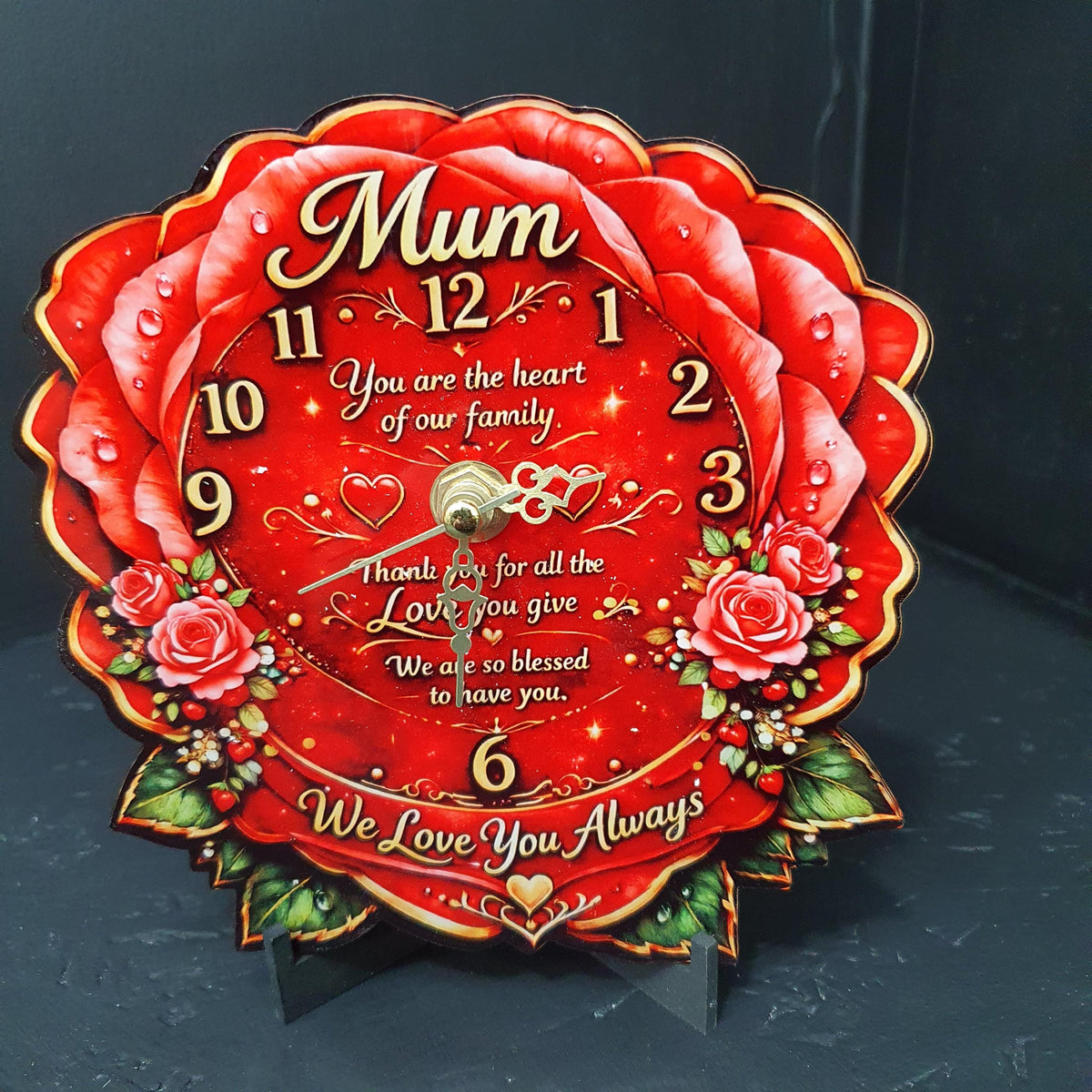 Beautiful rose-shaped Mum clock with vibrant red floral design and gold detailing, featuring heartfelt message and decorative roses.