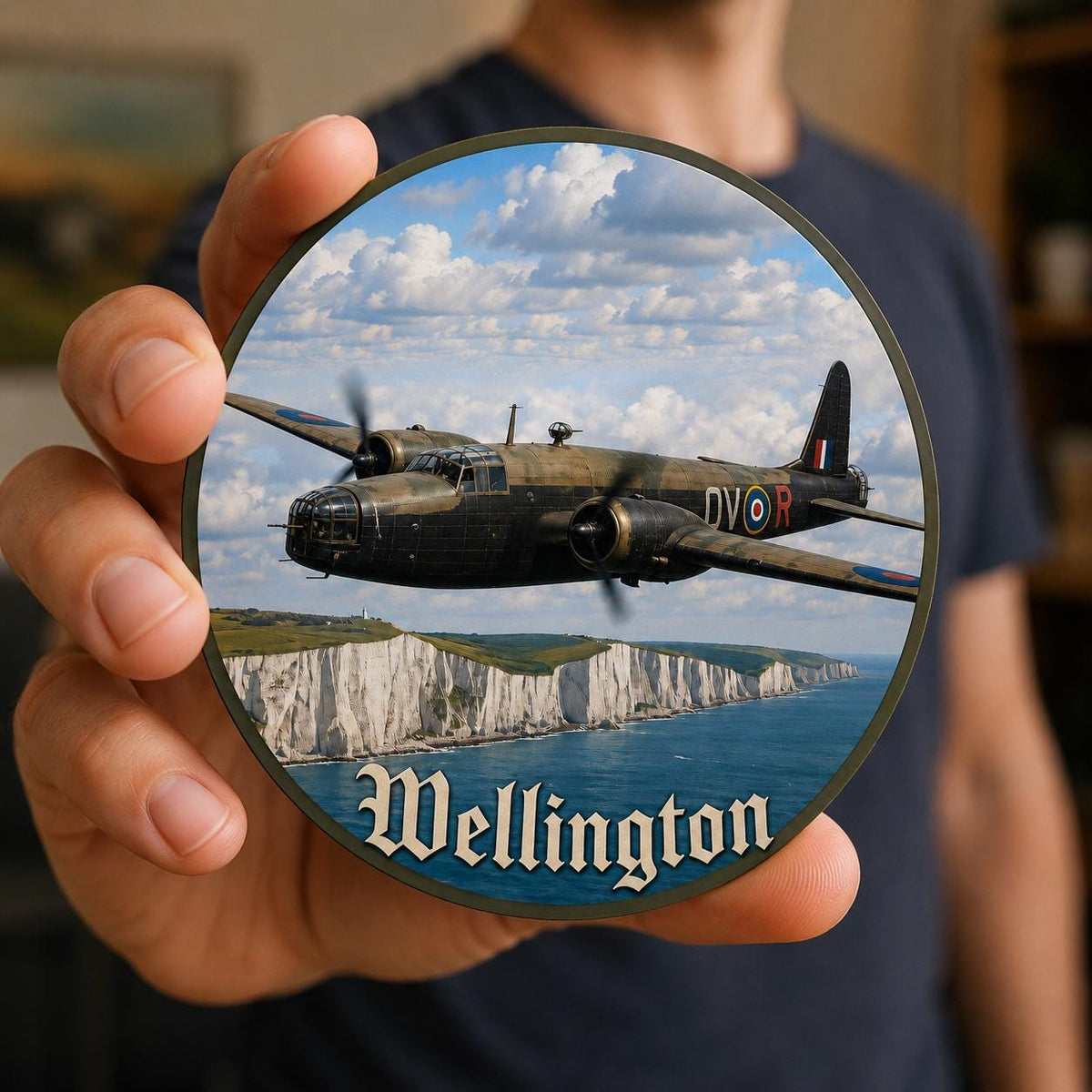 Wellington bomber coaster featuring classic RAF aircraft artwork above coastal cliffs with vibrant colours and realistic aviation detail.