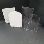 Set of clear and white acrylic arch and rectangle table number blanks with matching acrylic display stands.
