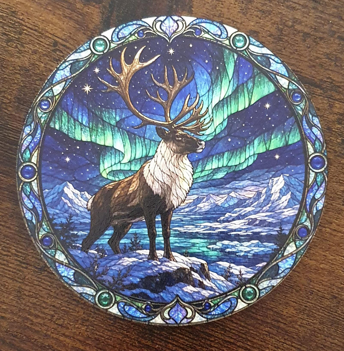 Elegant Arctic reindeer stained-glass style coaster featuring majestic antlers beneath colourful Aurora Borealis and snowy mountain landscape.