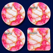 Luxury pink and white marble effect coaster set with shimmering gold veins, available in 10cm Acrylic, Wooden and Ceramic options. Elegant alcohol ink inspired design, perfect for coffee tables, dining rooms and stylish modern home décor.