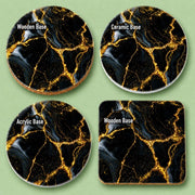 Luxury black and gold marble effect coaster set available in 10cm Acrylic, Wooden and Ceramic options. Elegant alcohol ink inspired design with shimmering metallic gold veins, perfect for modern home décor, coffee tables and stylish housewarming gifts.