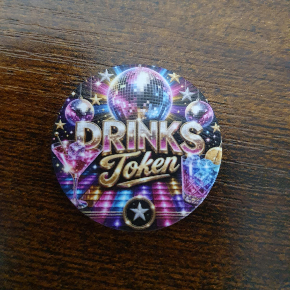 40mm Disco Fever Drinks Token featuring sparkling disco balls, colourful dance floor lights and premium drink voucher design.
