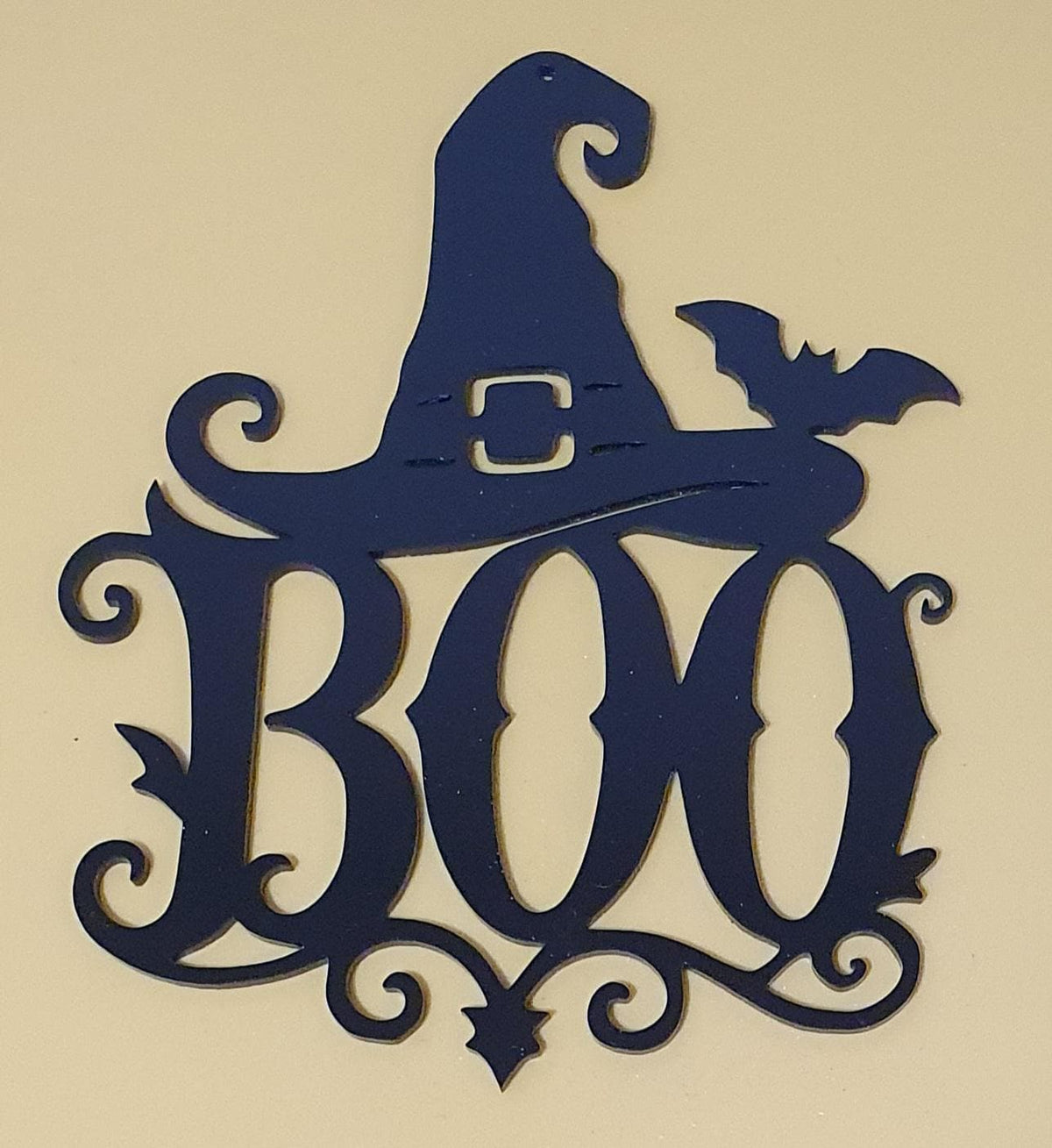 Black laser-cut acrylic Halloween BOO decoration featuring a curled witch’s hat, flying bats and decorative gothic flourishes.