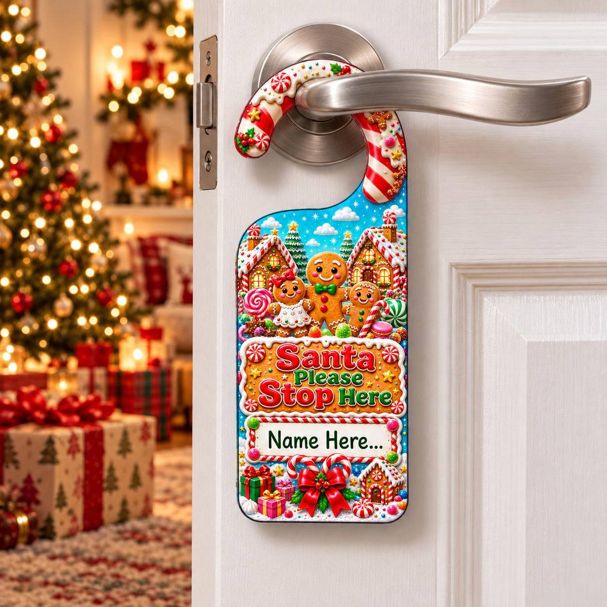 Personalised Santa Please Stop Here door hanger with three smiling gingerbread characters and a space for a child’s name.