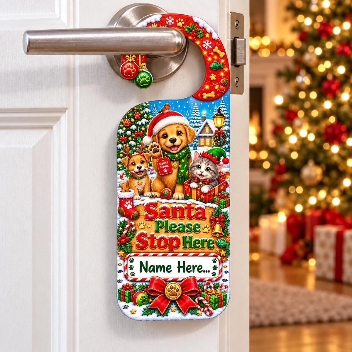 Personalised Santa Paws Christmas door hanger featuring two puppies, a kitten, presents and a space for a name.
