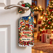 Personalised woodland Christmas door hanger with a fox, deer, rabbit, hedgehog and owl around a festive tree.